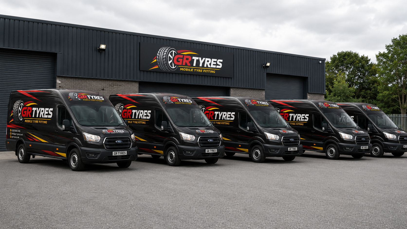 GR-Tyres van on a driveway alongside a car on a jack